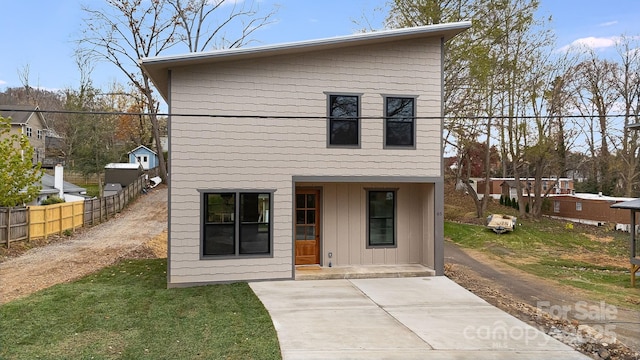 65 Bellevue Rd Unit 3, Asheville, NC 28803 - contemporary house with a patio, fence, and board and batten siding