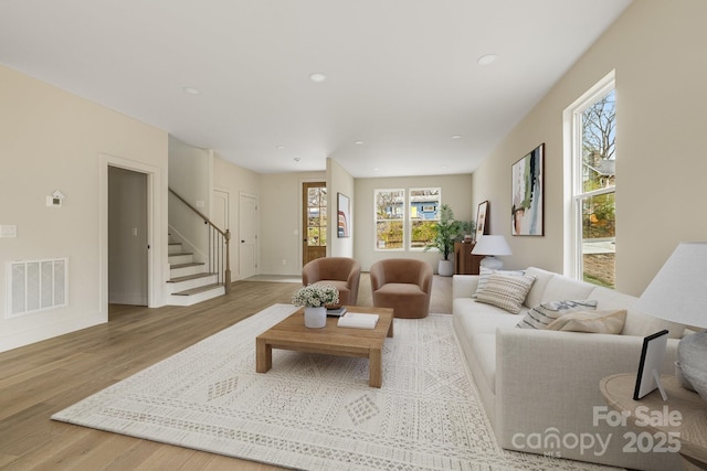 65 Bellevue Rd Unit 3, Asheville, NC 28803 - living area featuring stairway, wood finished floors, recessed lighting, and baseboards