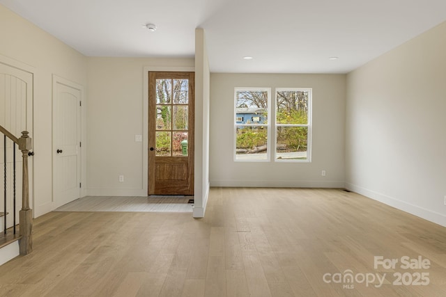 65 Bellevue Rd Unit 3, Asheville, NC 28803 - foyer with light wood finished floors, stairs, baseboards, and recessed lighting