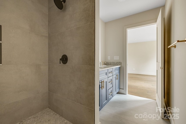 65 Bellevue Rd Unit 3, Asheville, NC 28803 - bathroom featuring tiled shower and vanity