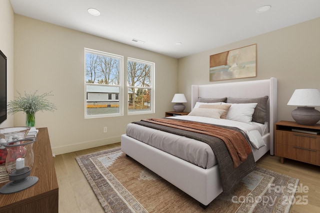 65 Bellevue Rd Unit 3, Asheville, NC 28803 - bedroom featuring light wood-style floors, recessed lighting, and baseboards