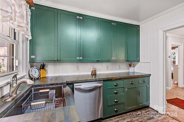 kitchen featuring green cabinets, crown molding, sink, and stainless steel dishwasher