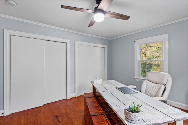 office space featuring hardwood / wood-style floors, ceiling fan, and ornamental molding