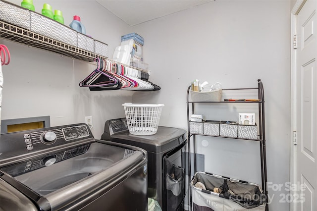 laundry area featuring independent washer and dryer