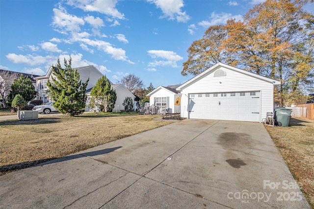 view of front facade featuring a garage and a front yard