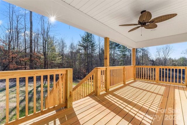 wooden deck with ceiling fan