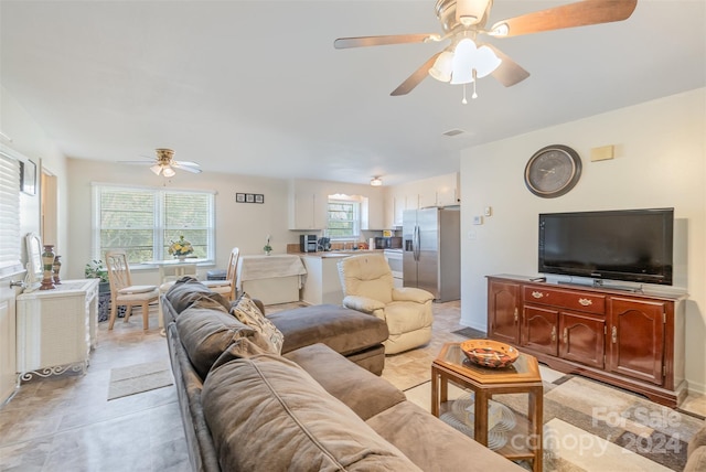 living room featuring ceiling fan