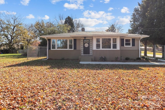 view of front of home with a front lawn