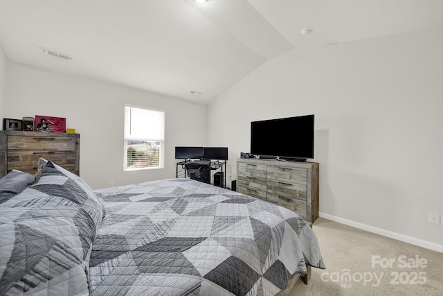 bedroom with lofted ceiling, visible vents, baseboards, and light carpet