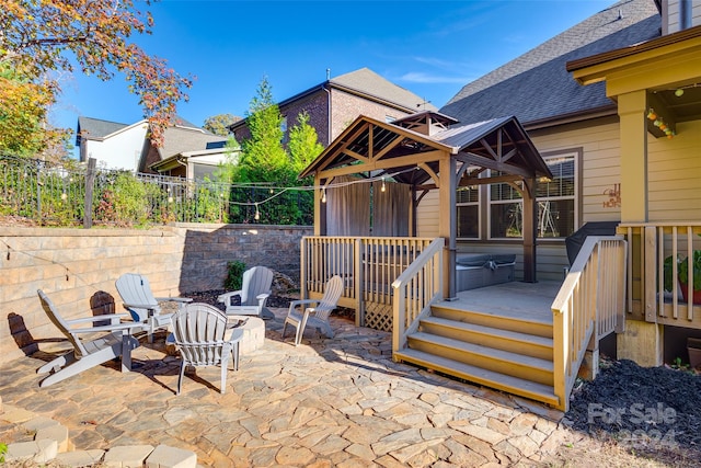 view of patio / terrace with a gazebo and a deck