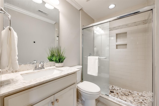 bathroom featuring crown molding, vanity, an enclosed shower, and toilet