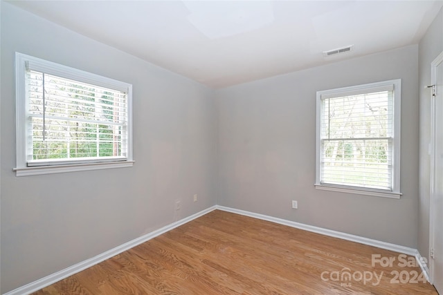 empty room with light wood-type flooring