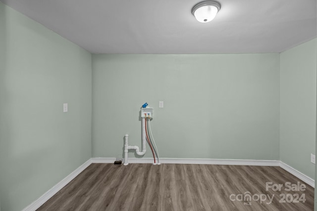 laundry area with hookup for a washing machine and wood-type flooring