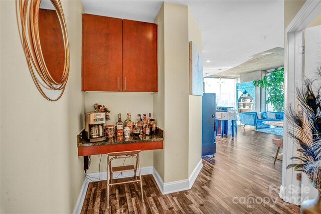 corridor featuring hardwood / wood-style flooring