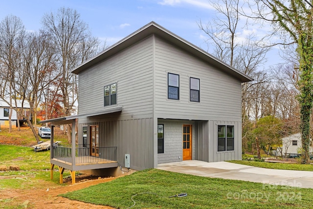 exterior space with a front lawn