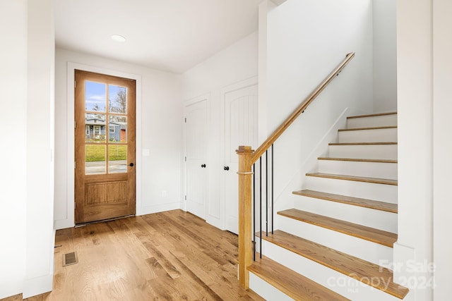 foyer with light hardwood / wood-style floors