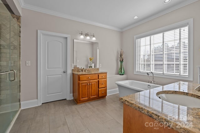 bathroom featuring vanity, crown molding, and plus walk in shower