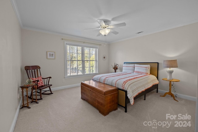 bedroom with ceiling fan, light colored carpet, and ornamental molding