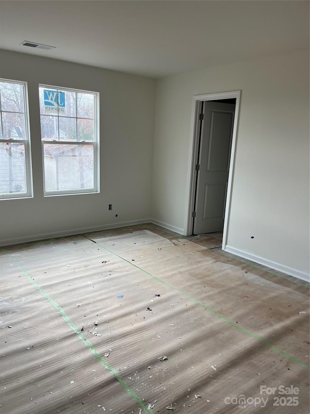 spare room with a wealth of natural light