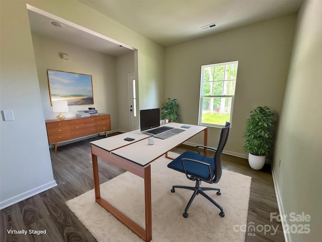 164 Wildwood Loop, Statesville, NC 28677 - home office with visible vents, wood finished floors, and baseboards