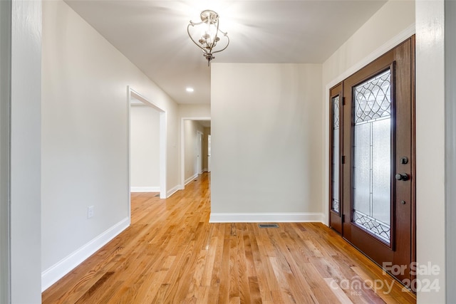 entryway with light wood-type flooring