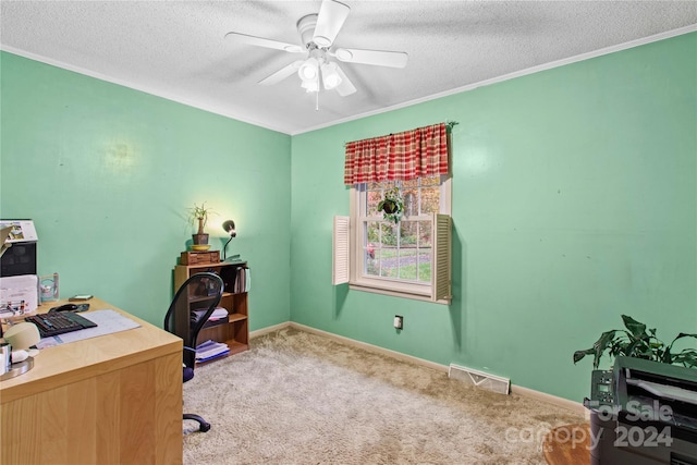 office space featuring carpet, ceiling fan, crown molding, and a textured ceiling