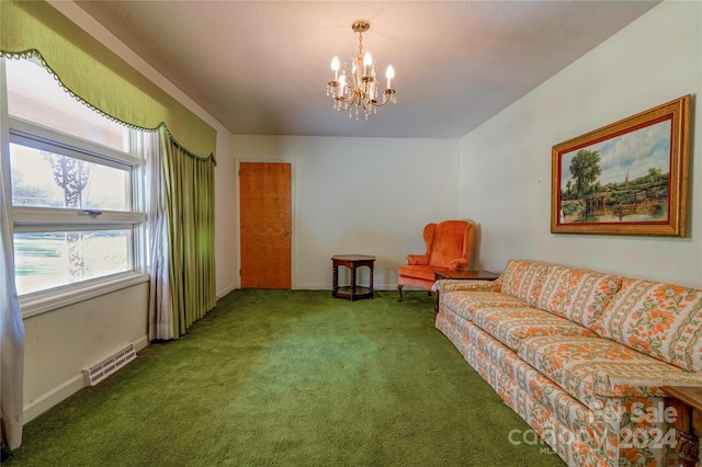 carpeted living room featuring a notable chandelier