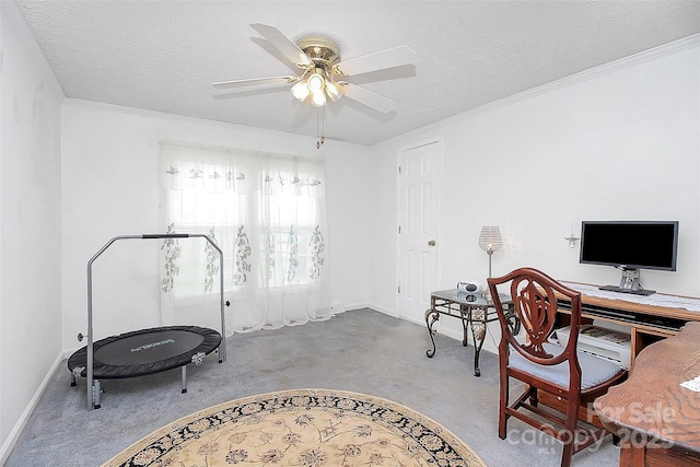 office with crown molding, baseboards, ceiling fan, and a textured ceiling