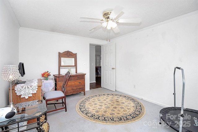 living area with a textured ceiling, ceiling fan, ornamental molding, and baseboards