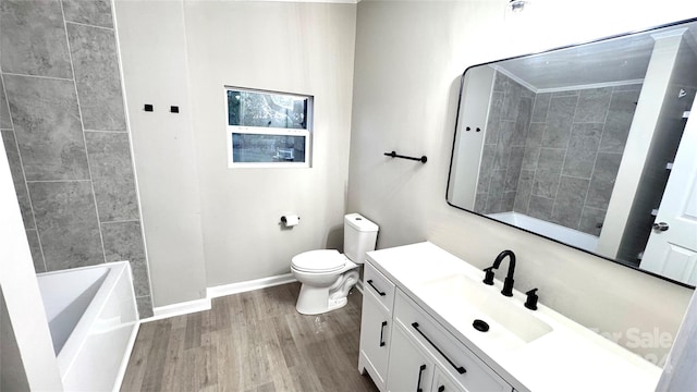 bathroom featuring vanity, hardwood / wood-style flooring, and toilet