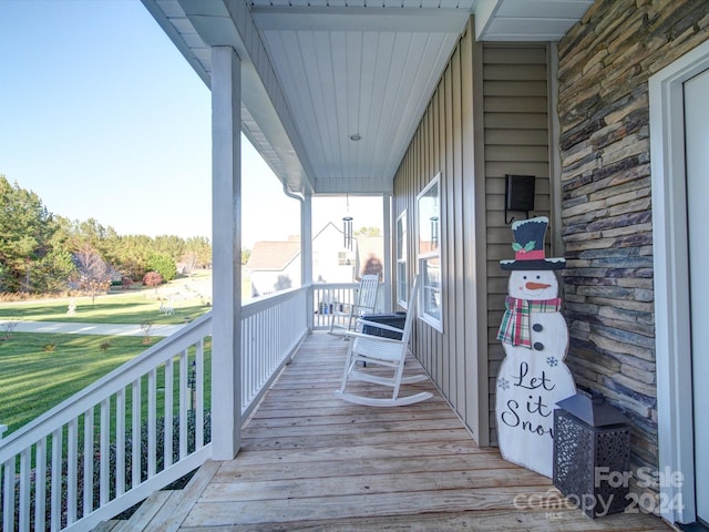 wooden terrace with covered porch