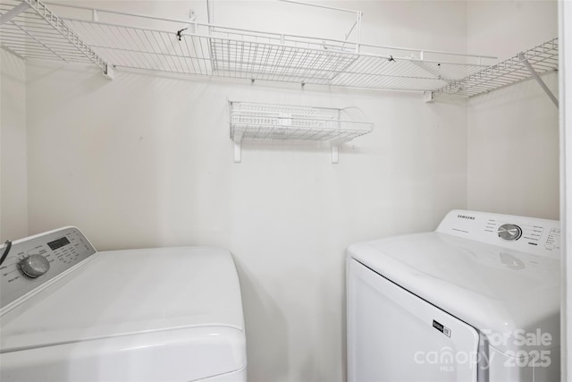 14922 Deshler Ct, Charlotte, NC 28273 - laundry area featuring washing machine and clothes dryer