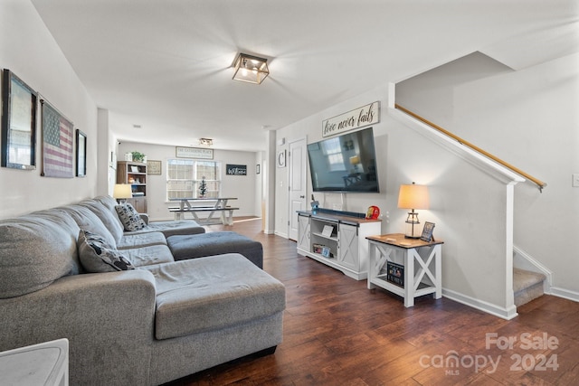 living room featuring dark hardwood / wood-style floors