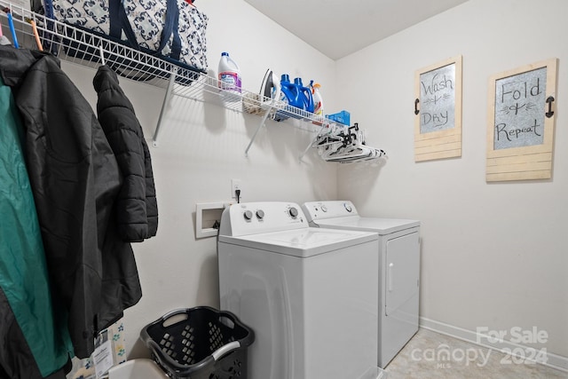 washroom featuring independent washer and dryer