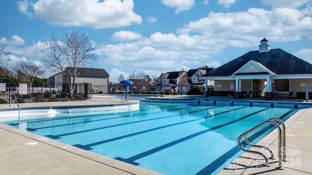 view of pool featuring a patio area