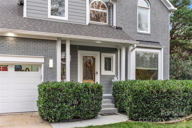 entrance to property featuring a garage