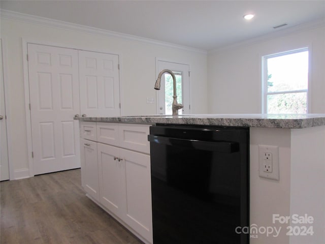 kitchen with dishwasher, white cabinets, light wood-type flooring, and ornamental molding