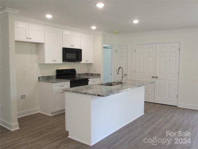 kitchen with a kitchen island with sink, black appliances, white cabinets, sink, and dark hardwood / wood-style flooring