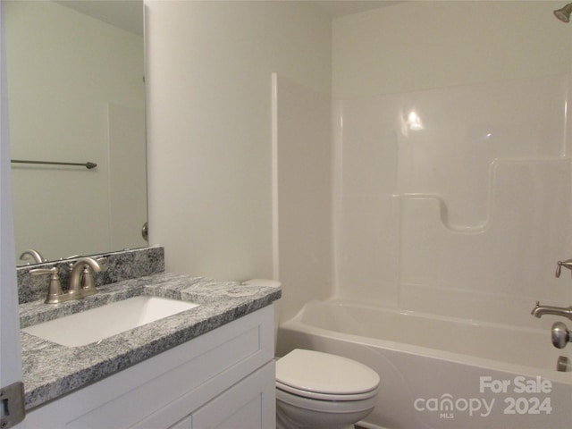 full bathroom with shower / tub combination, vanity, and toilet