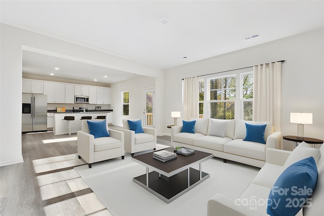 living room featuring light wood-type flooring