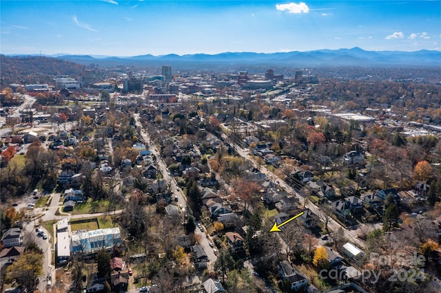 drone / aerial view featuring a mountain view