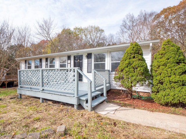 view of front of home with a deck