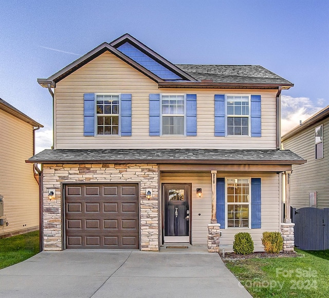 view of front of home with a garage