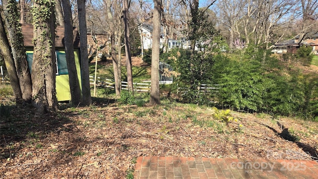 view of yard with fence