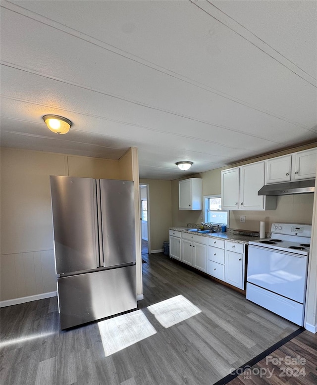 kitchen with white cabinetry, stainless steel fridge, dark hardwood / wood-style floors, and white electric stove