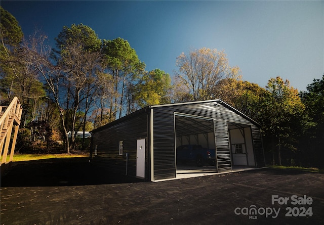 view of outdoor structure featuring a garage