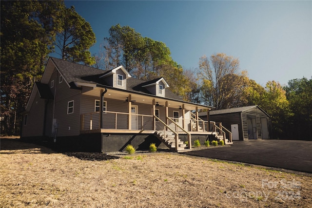 view of front of property featuring a carport and covered porch