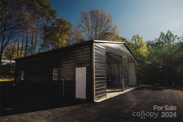 view of outbuilding with a garage