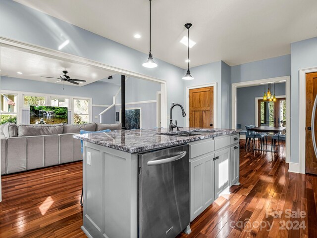 268 Firefly Cv, Lake Lure, NC 28746 - kitchen featuring dishwasher, dark wood-style floors, light stone counters, a center island with sink, and ceiling fan