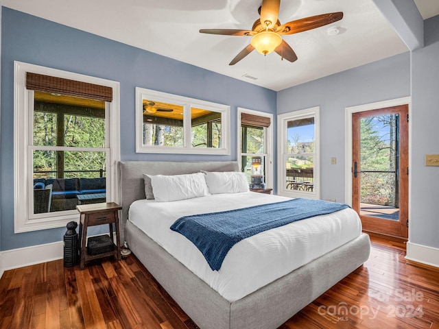 bedroom with access to outside, ceiling fan, and dark hardwood / wood-style flooring